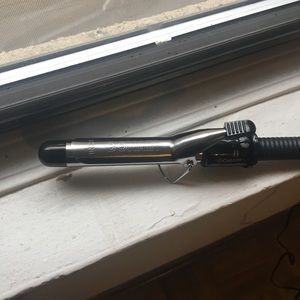 Conair curling iron, never used